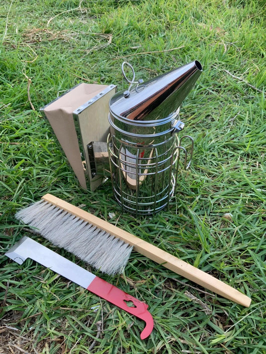 Beekeeping beginner starter kit with hive smoker, hive tool, and bee brush